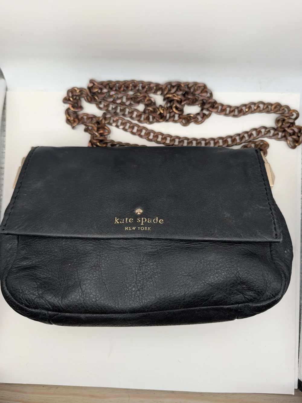kate spade black leather crossbody with bronze chain